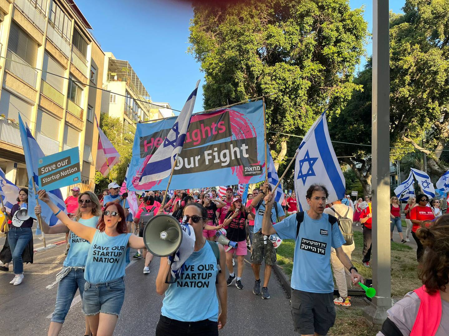 Protestors in Tel Aviv march against the government's judicial overhaul.