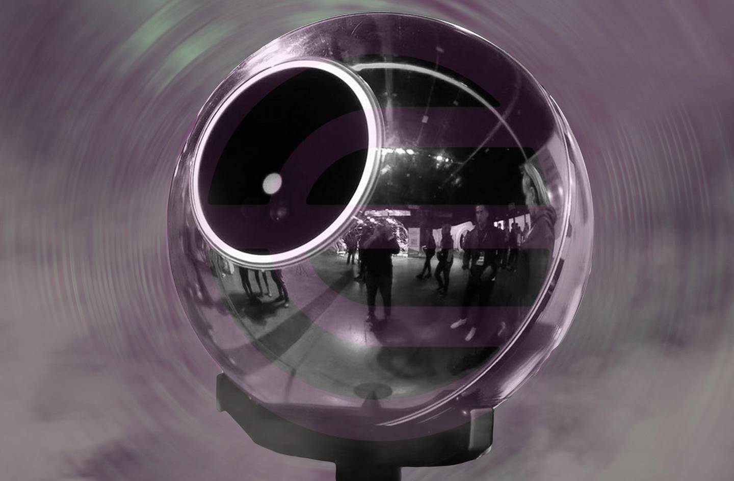 Portrait of the Worldcoin coin orb, with a superimposed Worldcoin logo, over a blurry background.