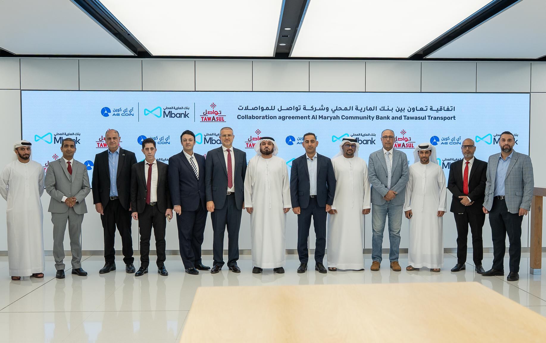 Tawasul Transport and Al Maryah Community Bank launch the first digital  payment system in taxis using AE Coin – DL News
